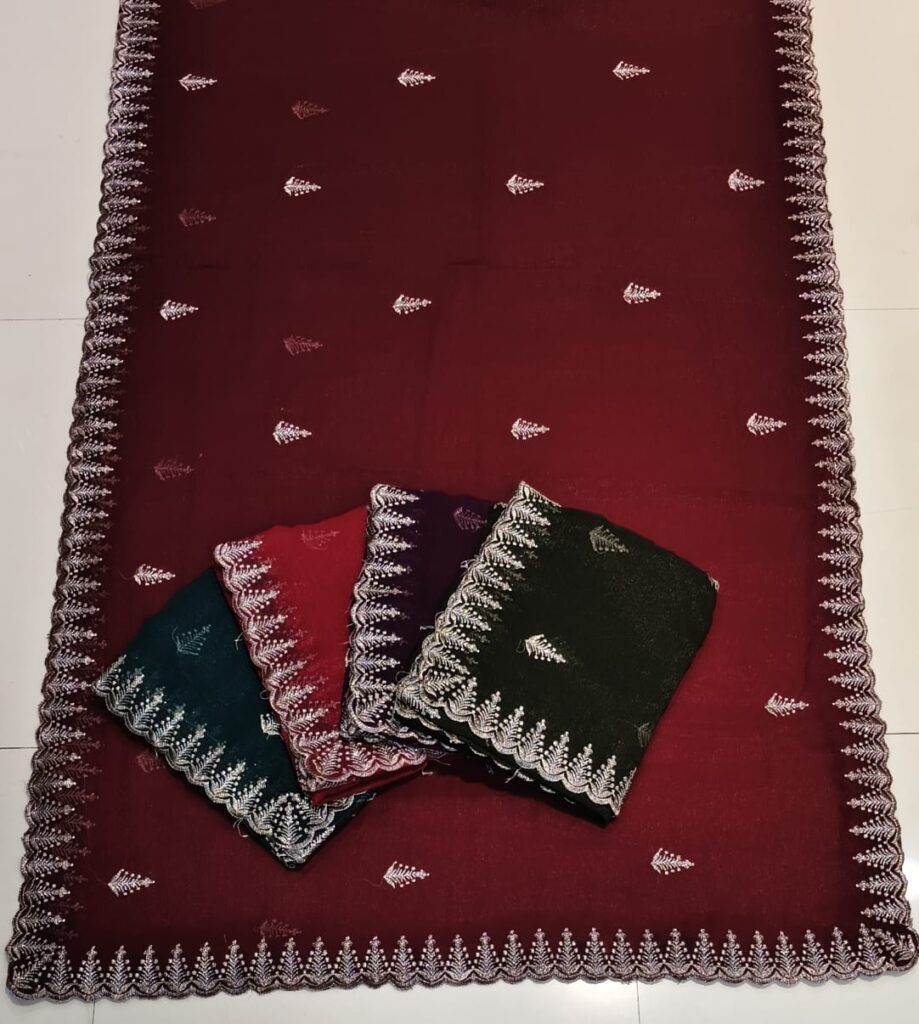 Designer embroidered sarees in maroon, green, red, and purple shades with elegant silver threadwork. The sarees feature delicate leaf motifs and a scalloped lace border, displayed on a maroon base saree. Ideal for weddings, festive wear, party wear, and traditional Indian occasions.